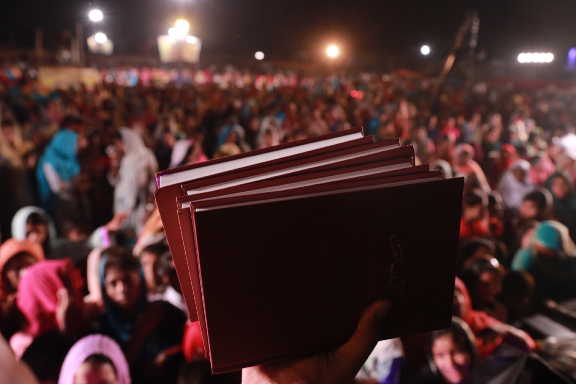 Free Urdu Bibles being distributed to crowds in Pakistan