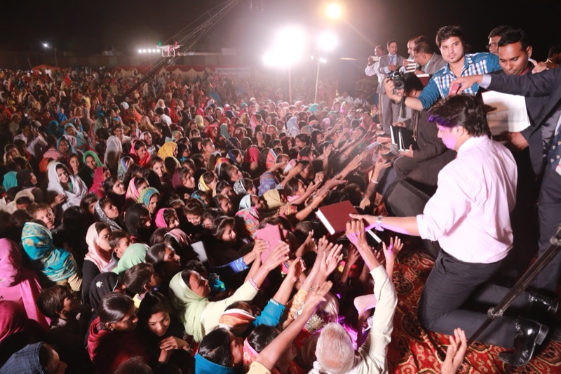 Massive Free Urdu Bibles Distribution at Outdoor Crusade in Pakistan